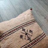 Beige Berber cushion with cotton pompom