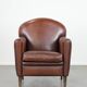 Sheepskin art deco design armchair with timeless and warm colours