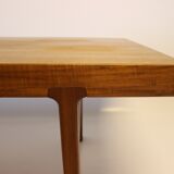 Table basse en teck avec feuille d'extension noire, design danois, années 1960.