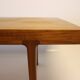 Table basse en teck avec feuille d'extension noire, design danois, années 1960.