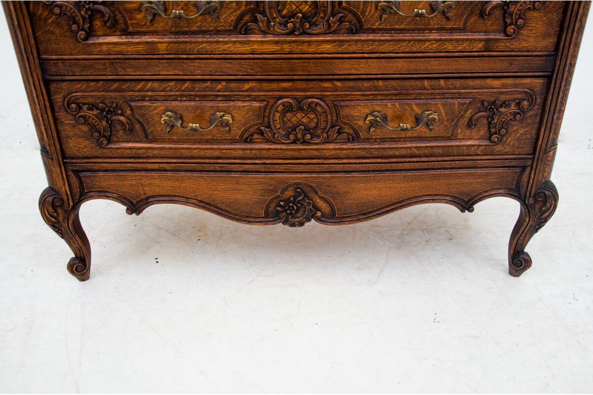 Oak Louis XV style chest of drawers, France, circa 1920.