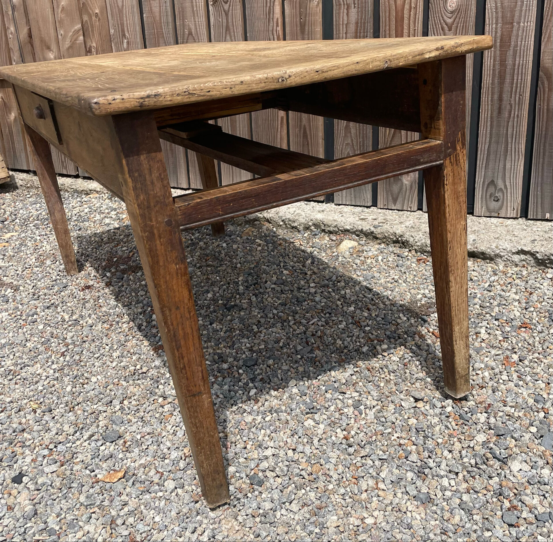 Solid oak farmhouse table with 2 drawers.