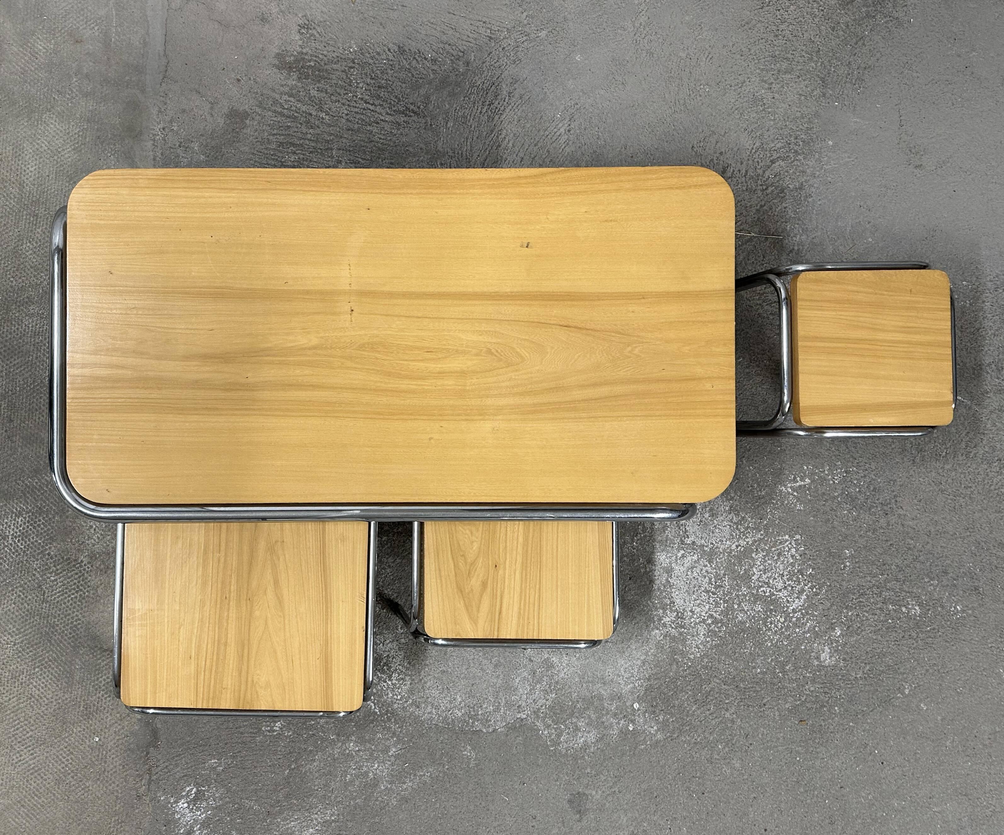 Set of 4 nesting coffee tables from the 70s, metal and solid oak.