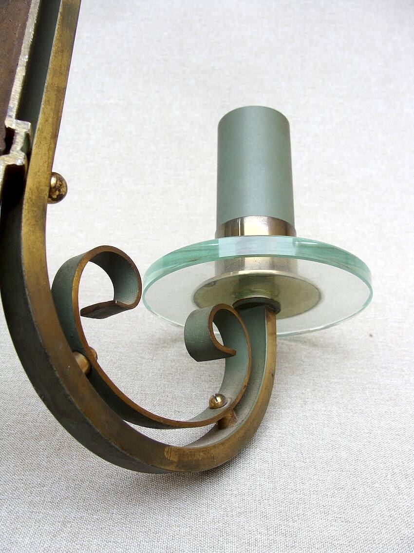 Pair of art deco lacquered metal, brass and glass wall lights