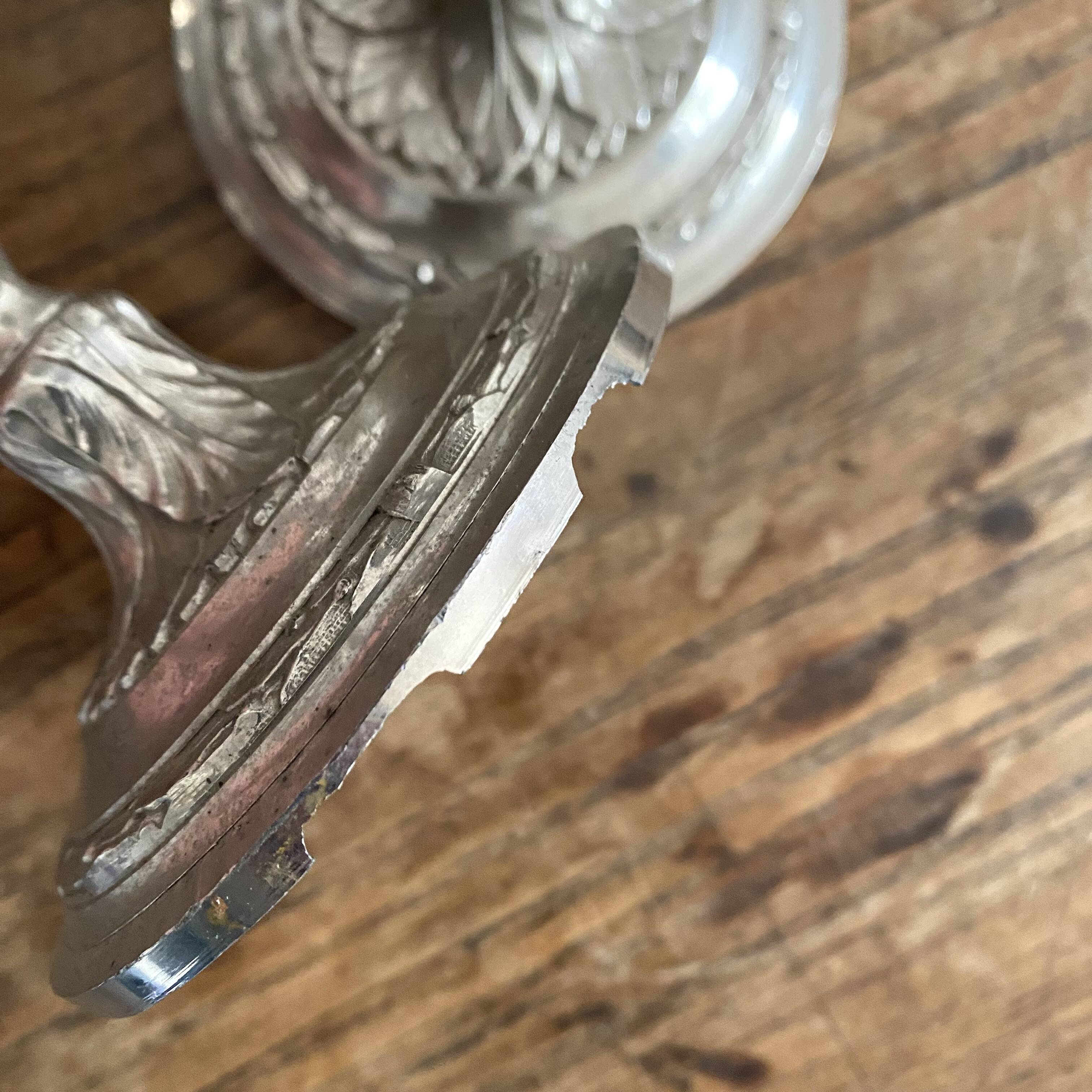 Antique silver-plated metal candlesticks