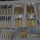 Housewife in silver and gold metal 104 cutlery