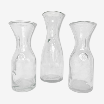 Lot of three glass carafes