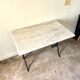 Bistro table in grey marble and cast iron
