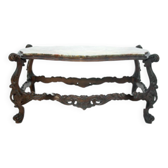A table with a marble top, Italy, early 20th century.