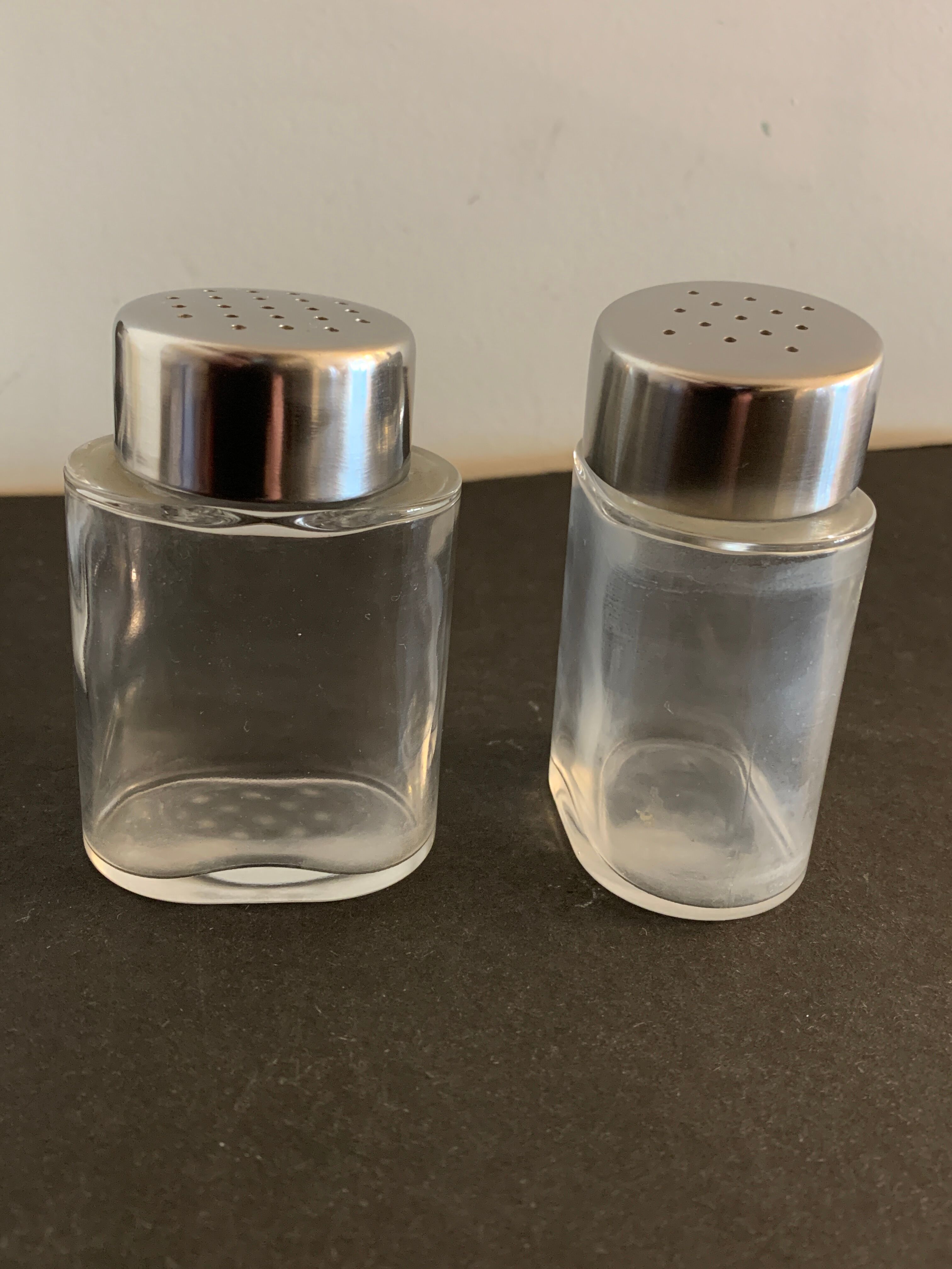 Italian salt and pepper shaker in stainless steel and Alessi glass, 1980