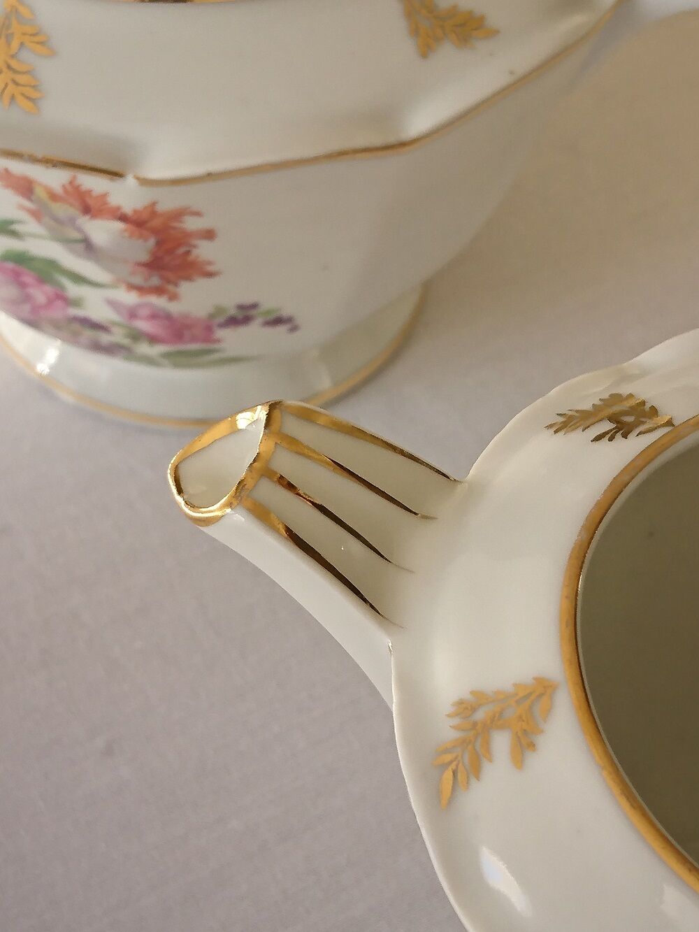 Sugar bowl and milk jar in flowery white porcelain