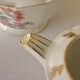 Sugar bowl and milk jar in flowery white porcelain