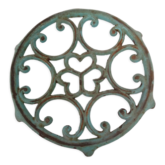 Dessous de plat en fonte ancien