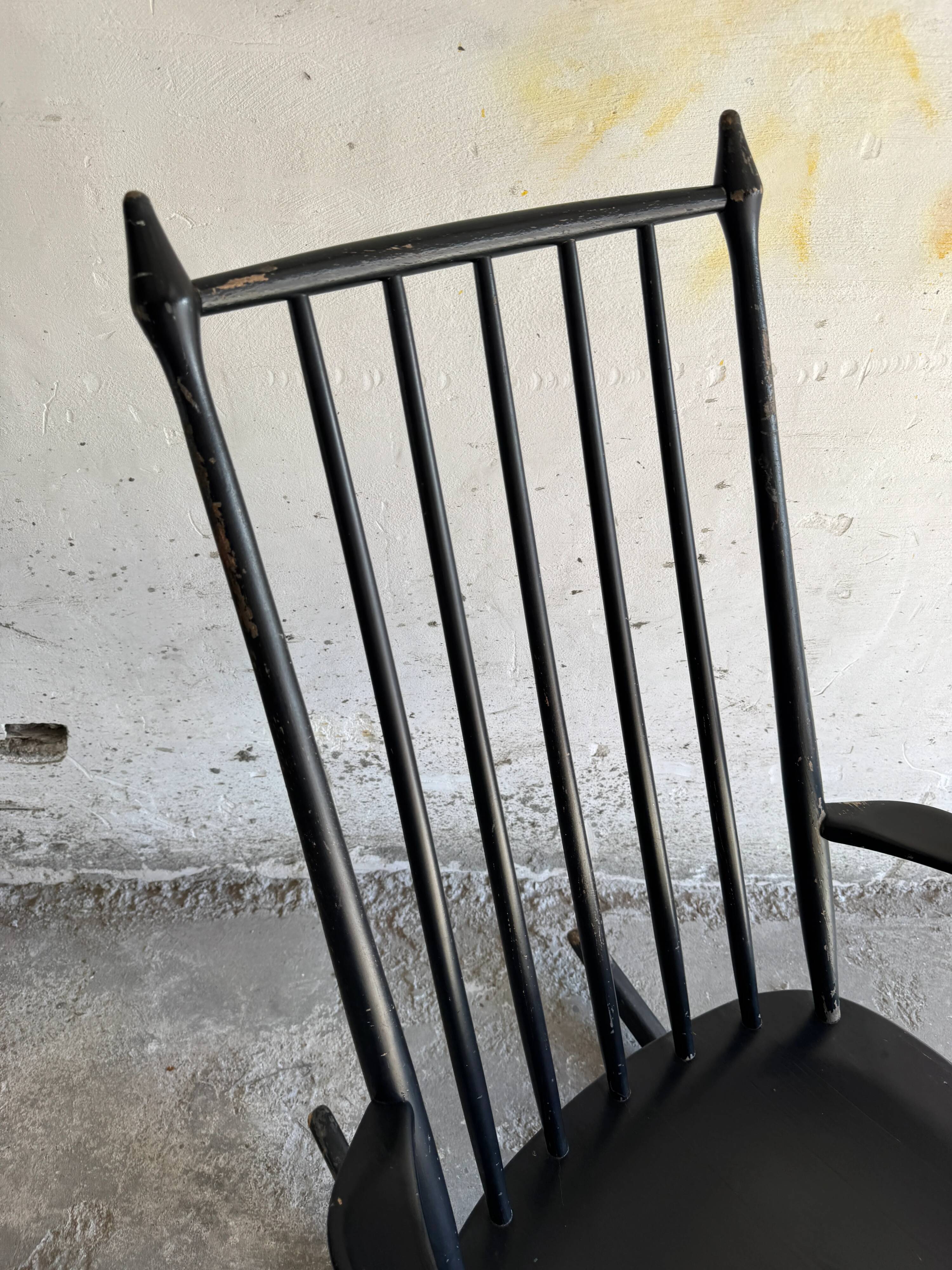 Black solid wood Scandinavian Windsor rocking chair — tall spindle back, mid-20th century