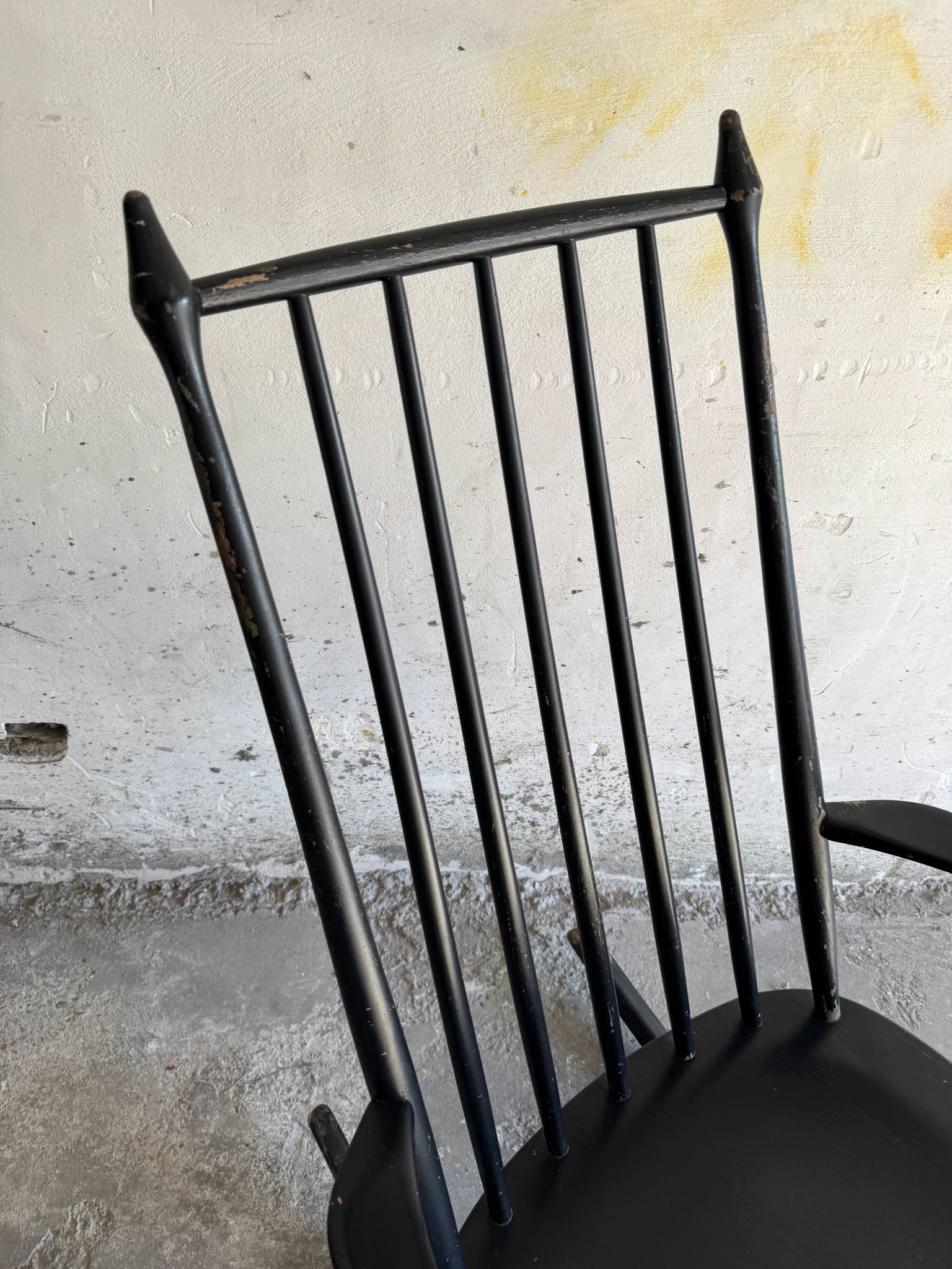 Black solid wood Scandinavian Windsor rocking chair — tall spindle back, mid-20th century