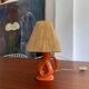 Vintage ceramic and raffia lamp