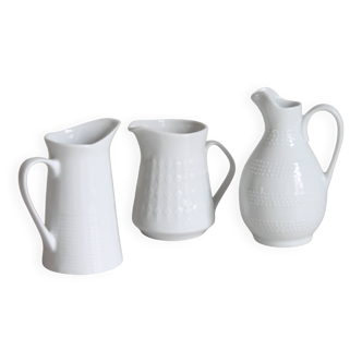 3 old French pitchers in white ceramic