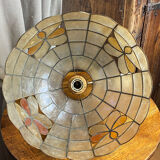 Mother-of-pearl and brass pendant with floral decoration.