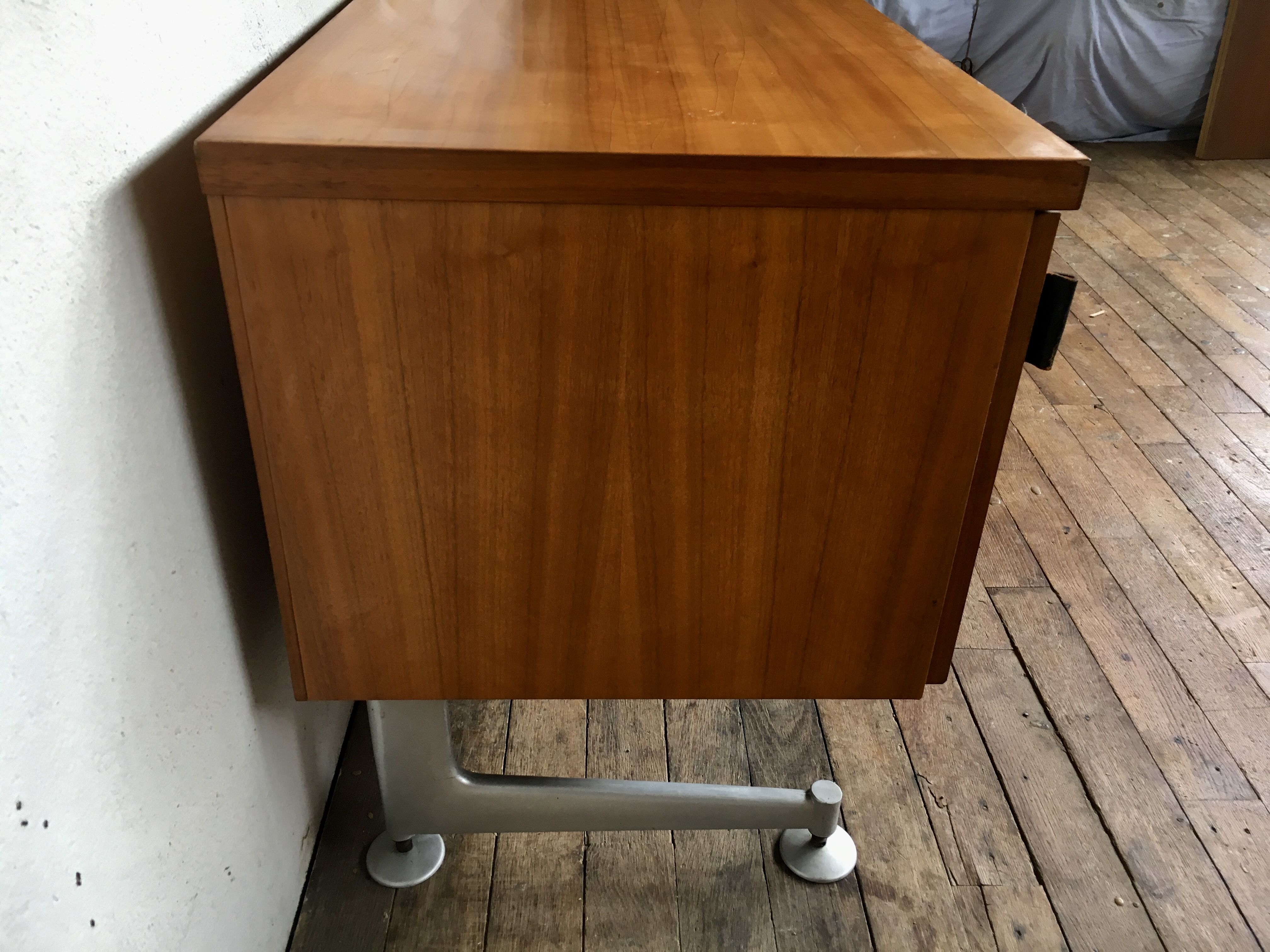 Sideboard in teak feet chrome sliding doors by Voko in 1960