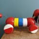 Lacquered wooden pull-along dog toy