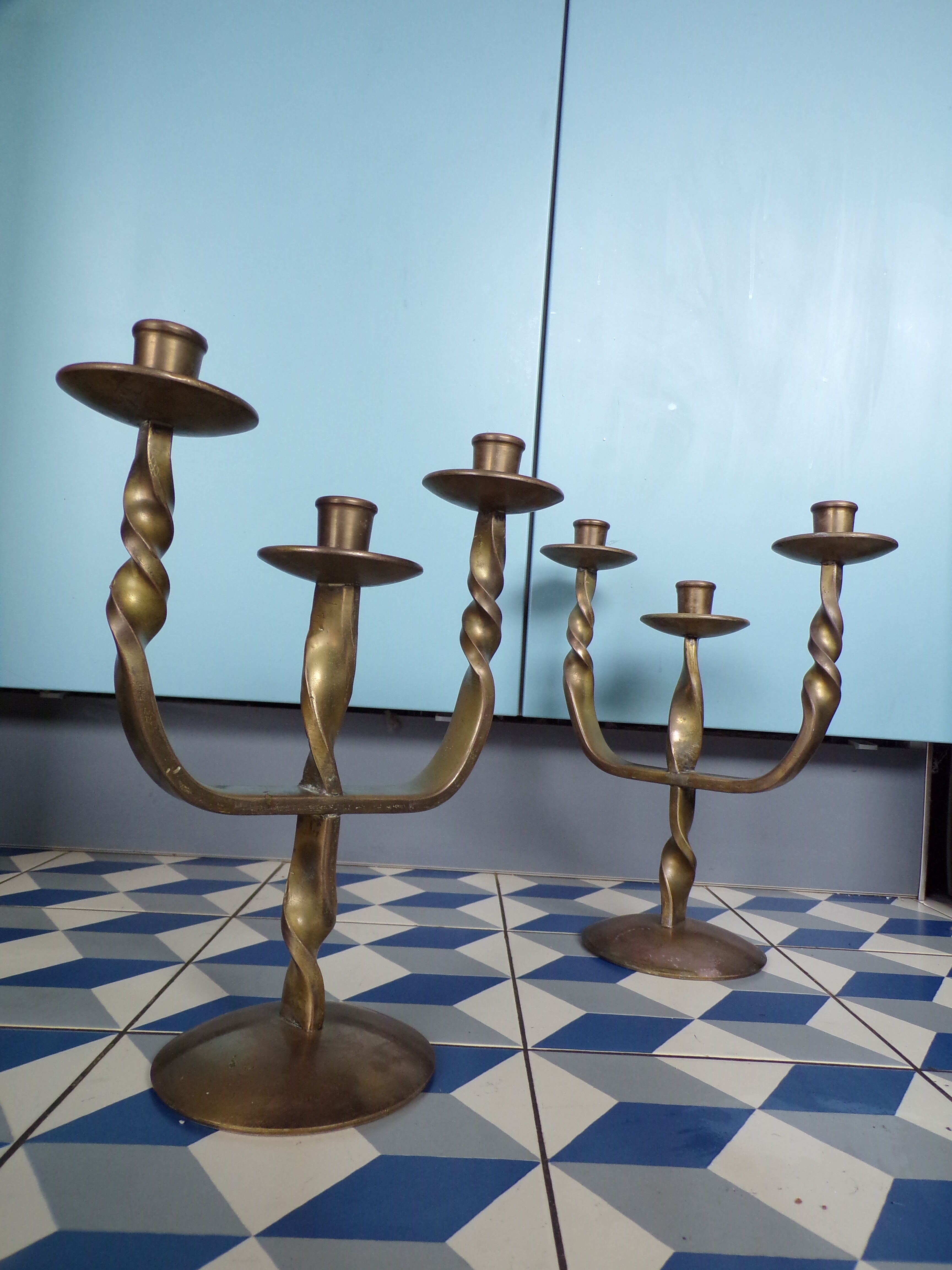 Pair of brutalist bronze candle holders