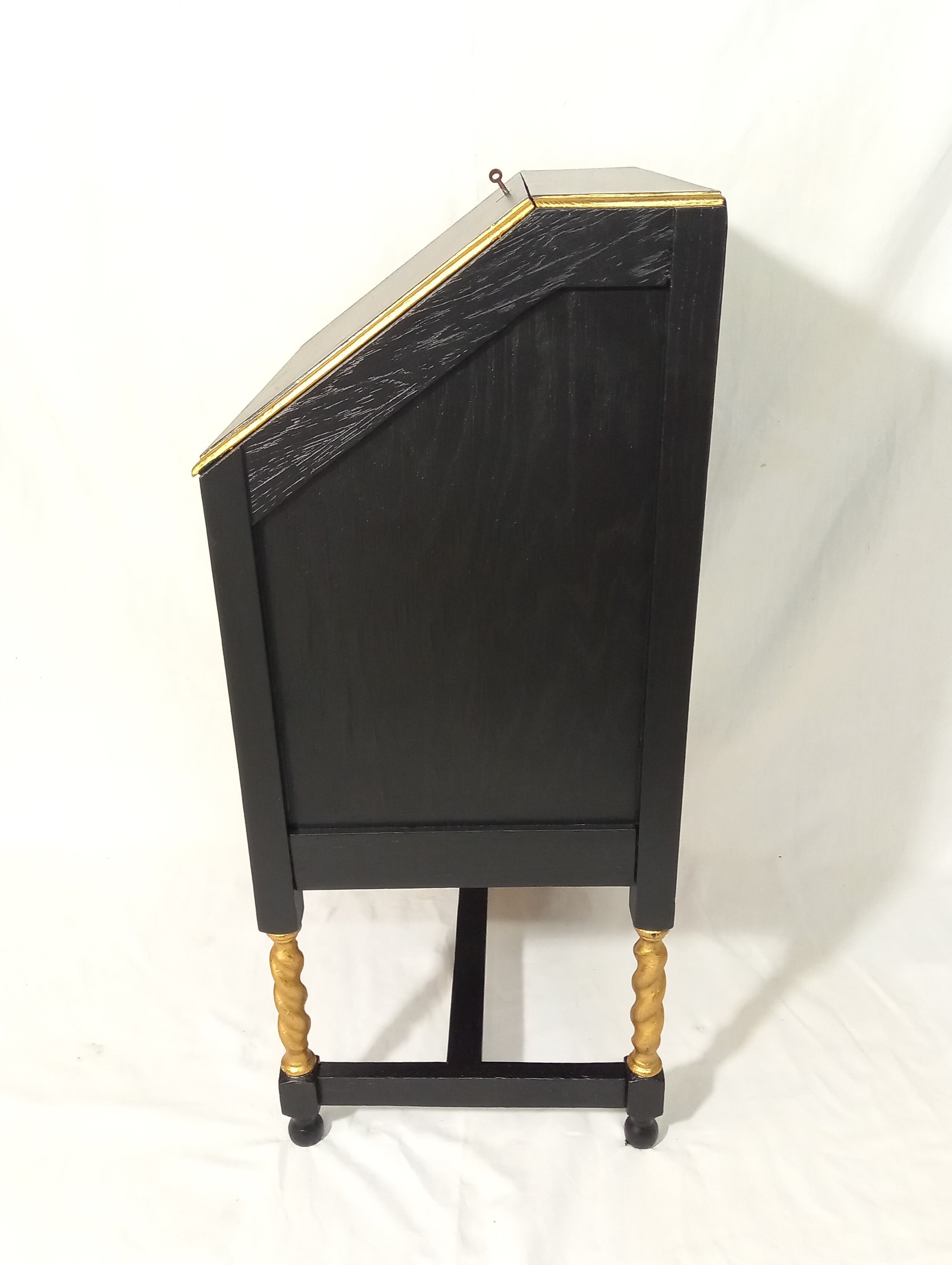 Small secretary with black and gold lid