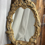 Rococo style mirror in wood and gilded stucco