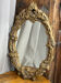 Rococo style mirror in wood and gilded stucco