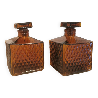 Set of 2 amber-colored carafes