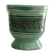 Cache enamelled terracotta pot