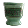 Cache enamelled terracotta pot