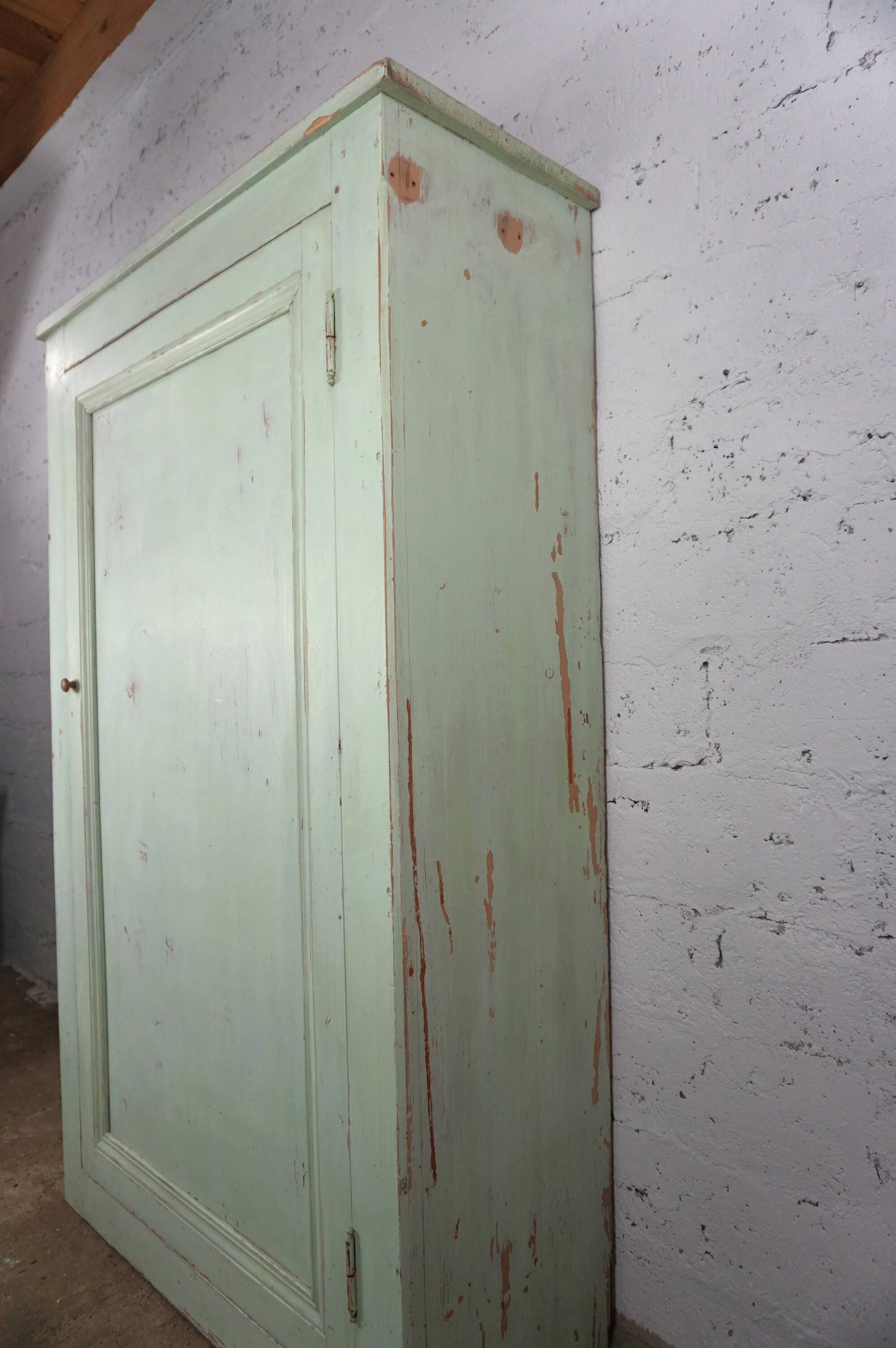 Pale green pantry cupboard