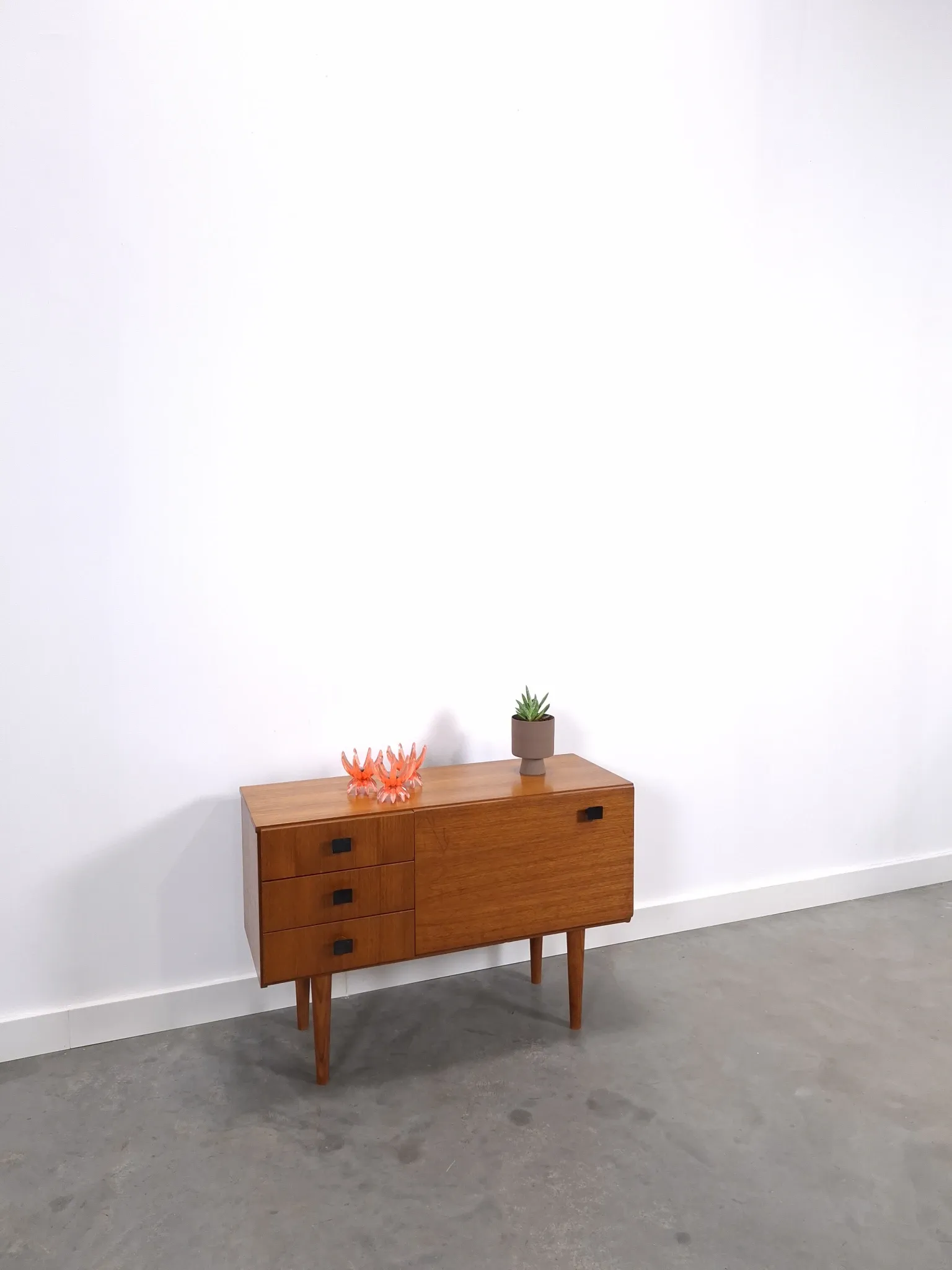 Vintage small teak cabinet with drawers, flap and black handles, hallway cabinet.