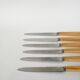set of 6 large bakelite toothed knives 1960