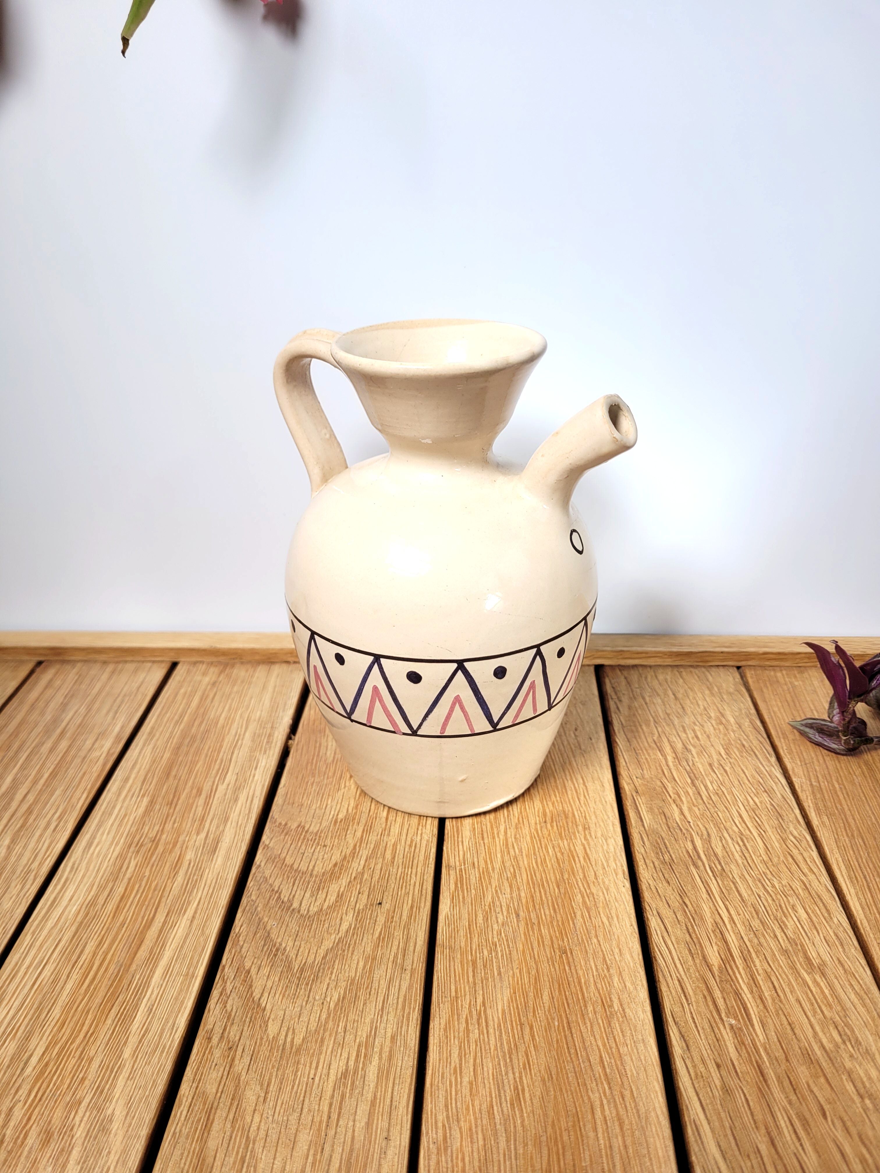 Ceramic pitcher decorated pottery