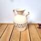 Ceramic pitcher decorated pottery