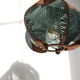 Dark green woven lamp to hang