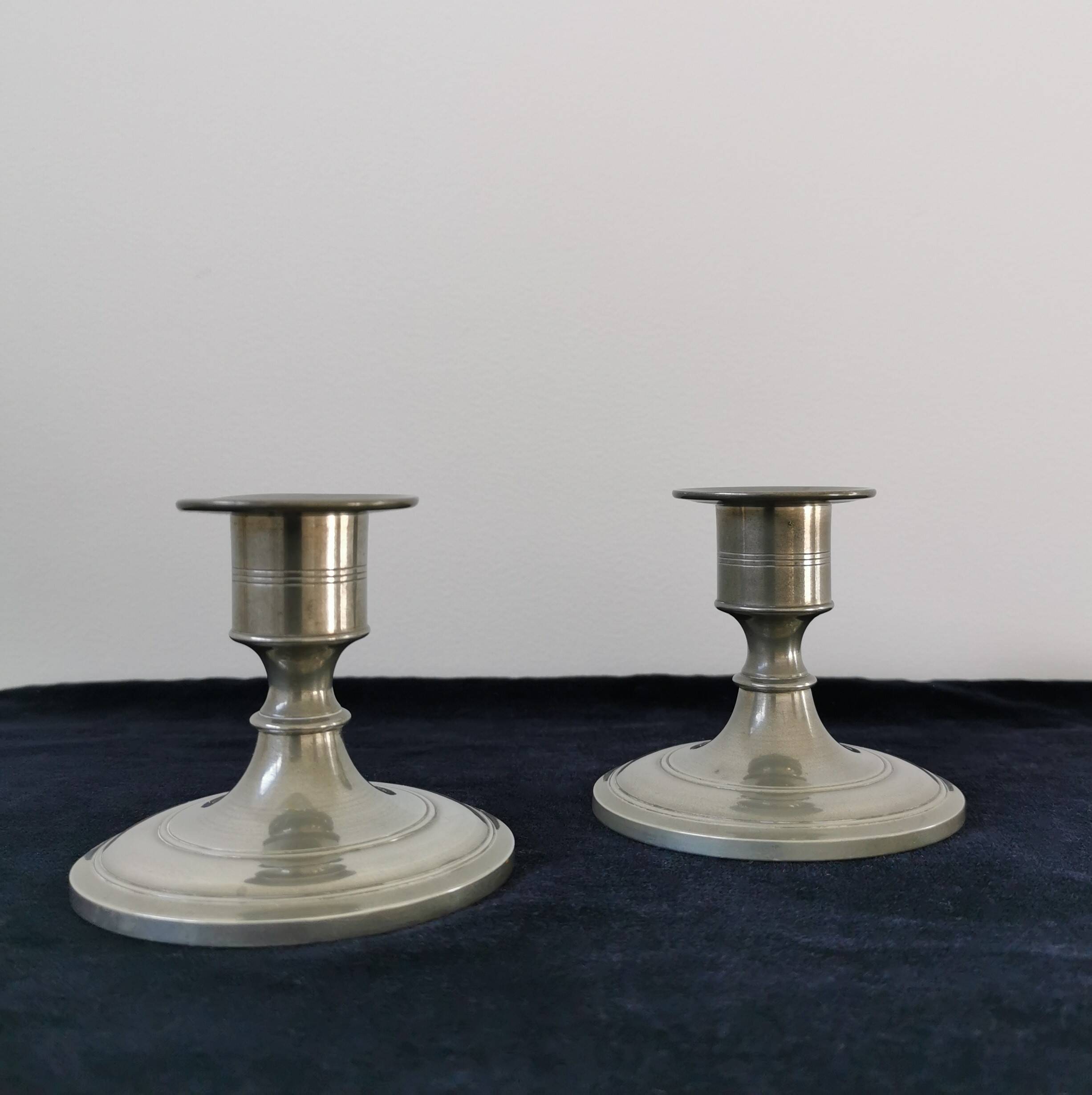 Pair of pewter candlesticks