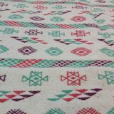 White carpet with multicolored Berber patterns handmade