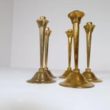 Mid-century set of 5 brass candlesticks by Lars Holmström, Arvika, Sweden.