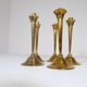 Mid-century set of 5 brass candlesticks by Lars Holmström, Arvika, Sweden.