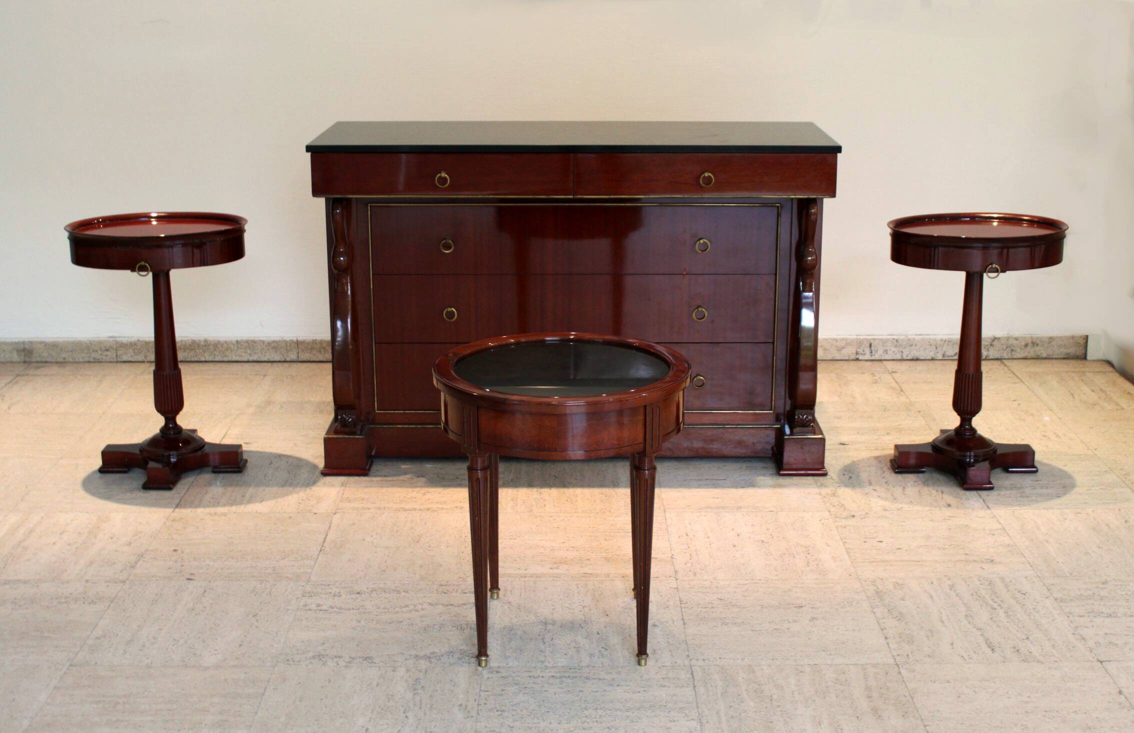 Mahogany “swan neck” chest of drawers, Empire style, 19th century.