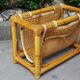 Vintage rattan magazine rack