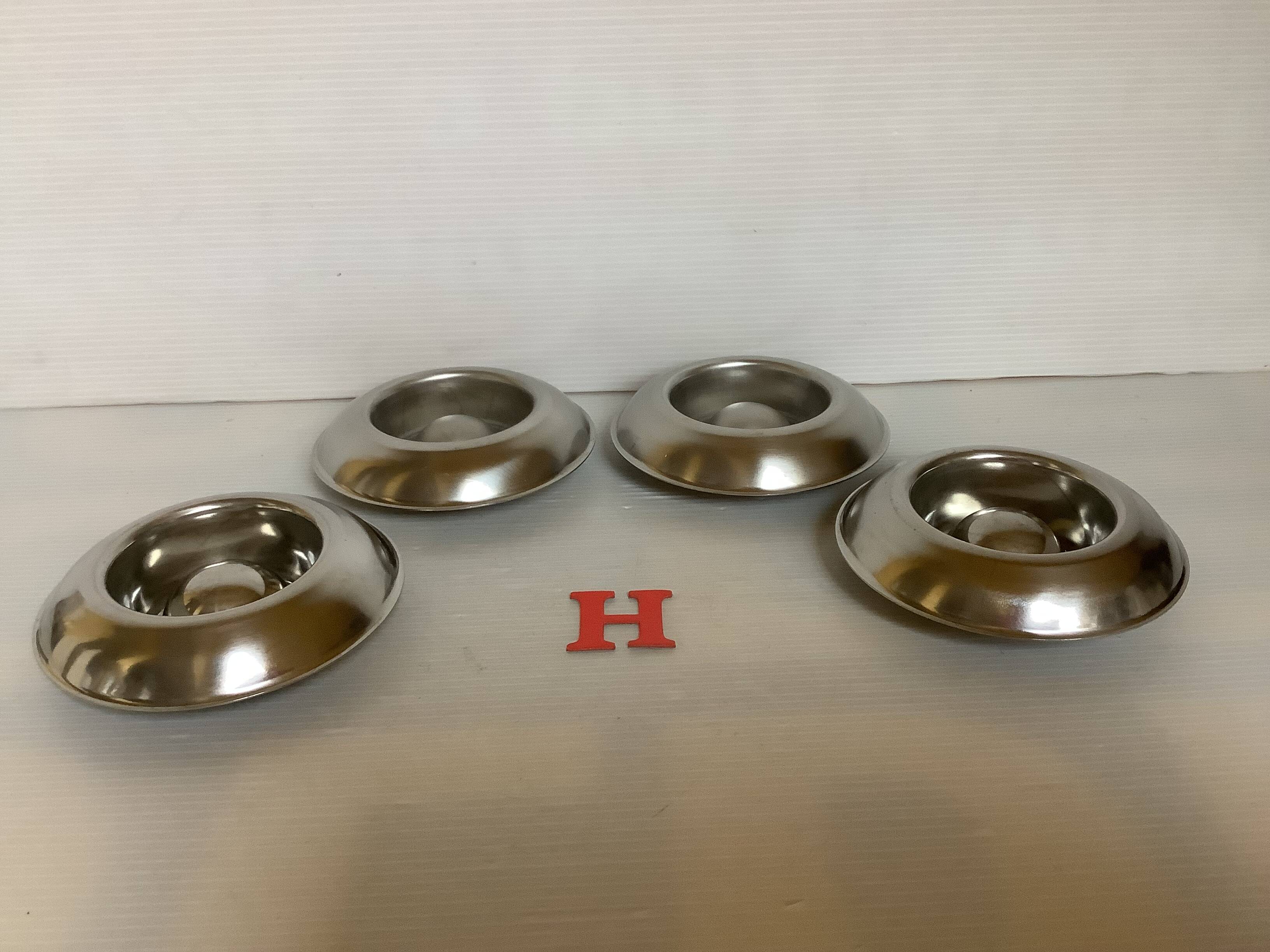 Four Belgium H stainless steel egg cups