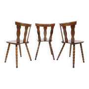 Set of 3 brutalist chairs with arched cut-outs and turned legs