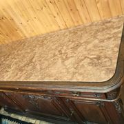 Buffet from the late 19th century with pink-brown marble in Louis XV style.