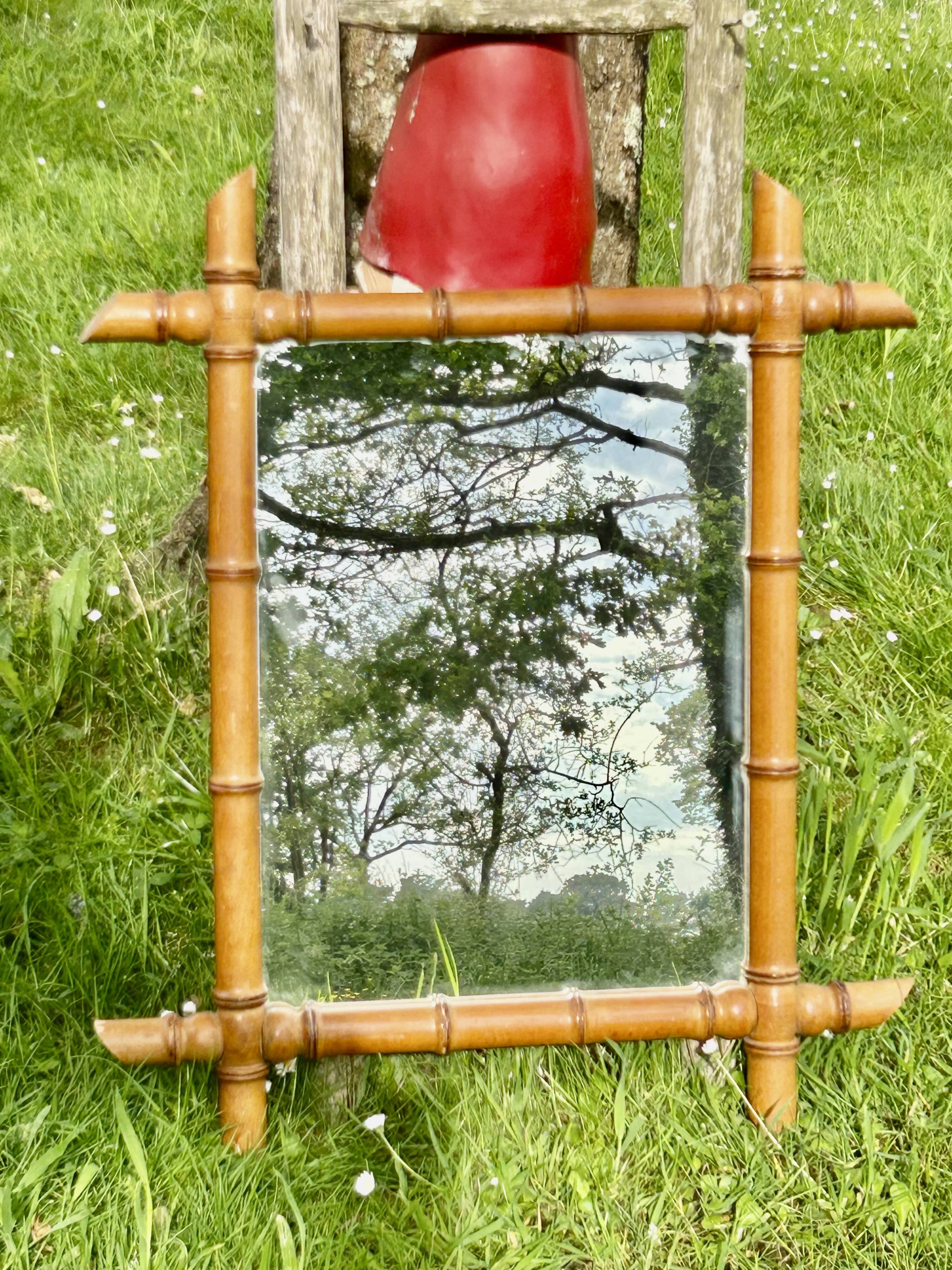 Large format for this type of faux bamboo mirror 70 cm.