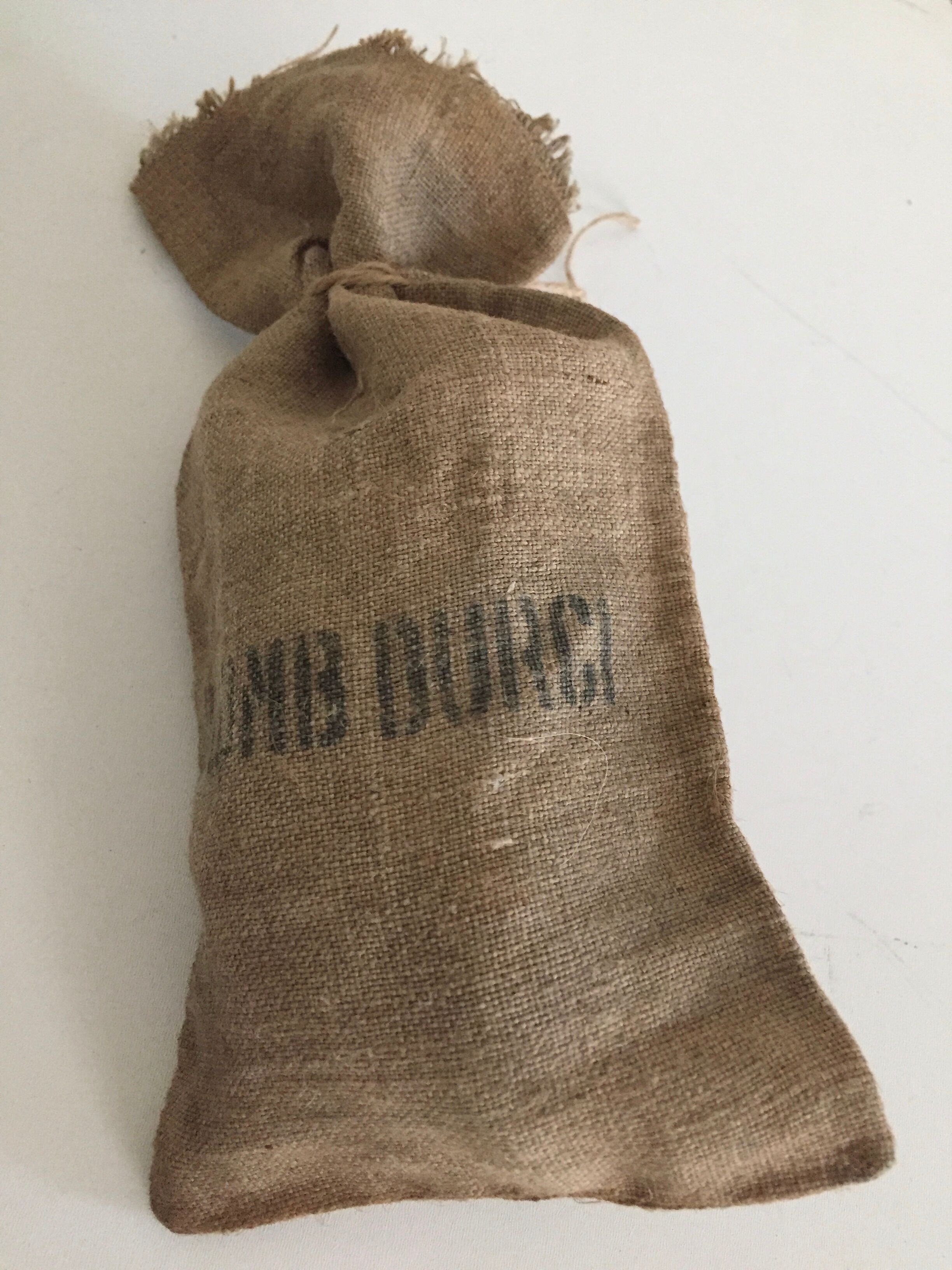 Set of three small jute bags, hardened lead