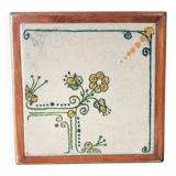 Vintage ceramic trivet – stylised floral design