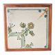 Vintage ceramic trivet – stylised floral design